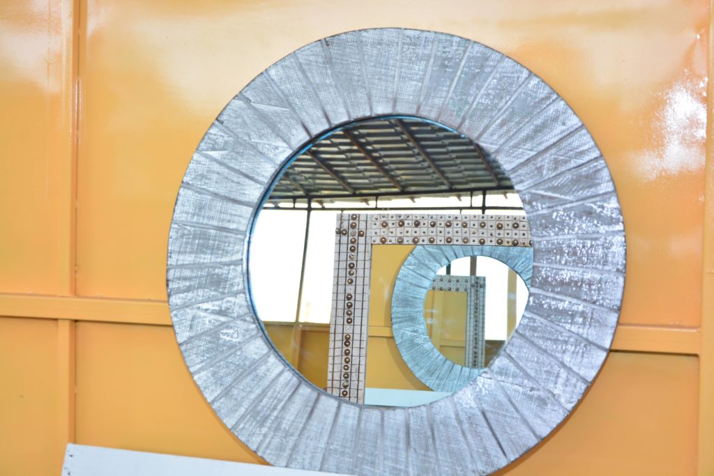 Round Swahili Hand Carved Mirror. The Auction Centre